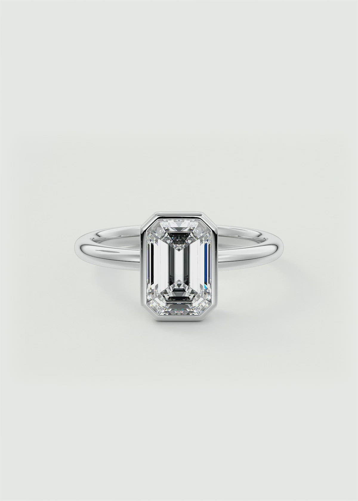 The Emerald Bezel Solitaire Engagement Ring by Frank Darling