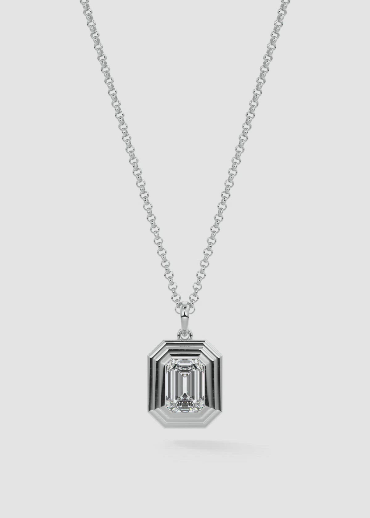 Chunky Emerald Cut Diamond Pendant in Radiator Bezel Setting by