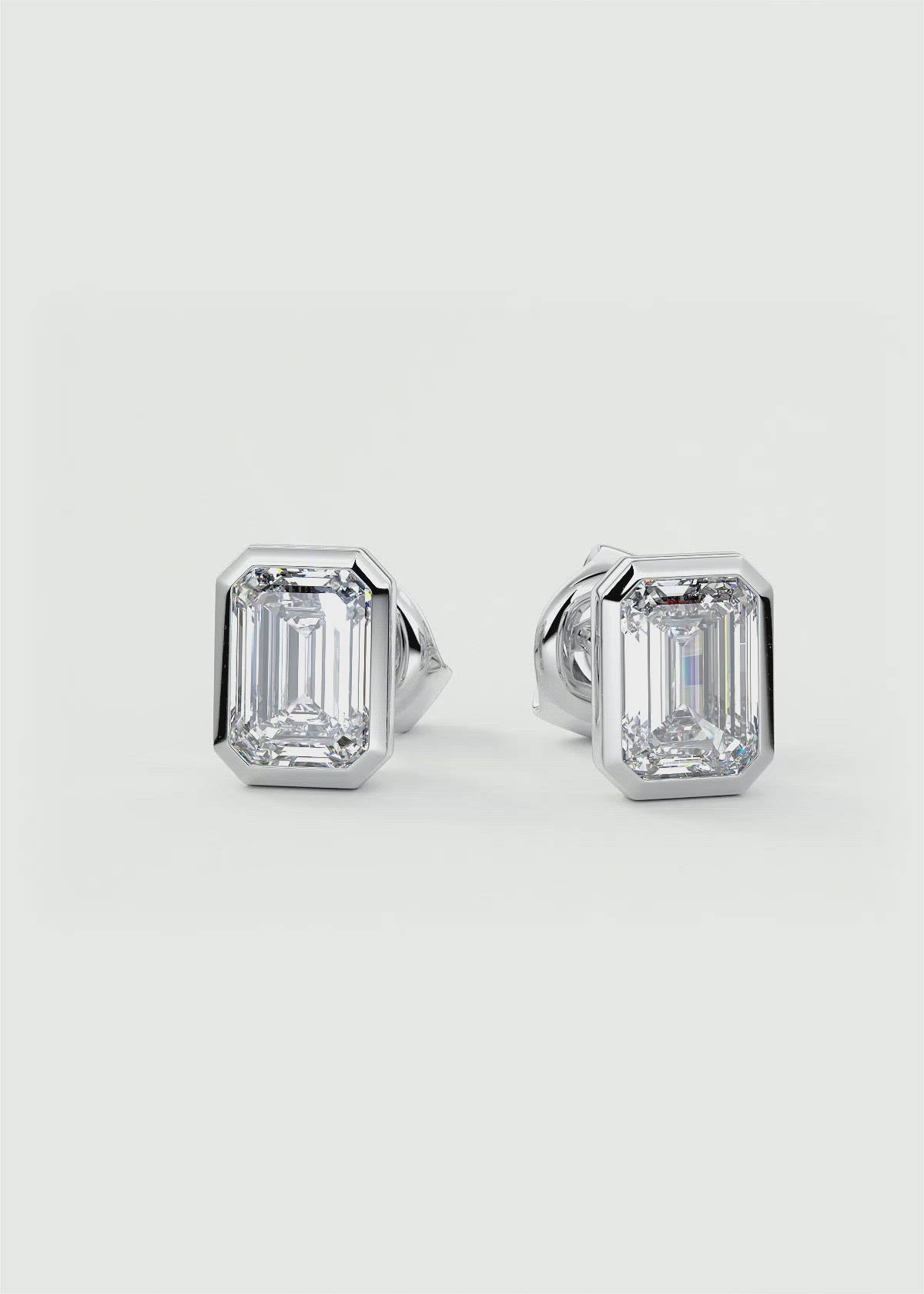Half Bezel Set Diamond Studs by Frank Darling