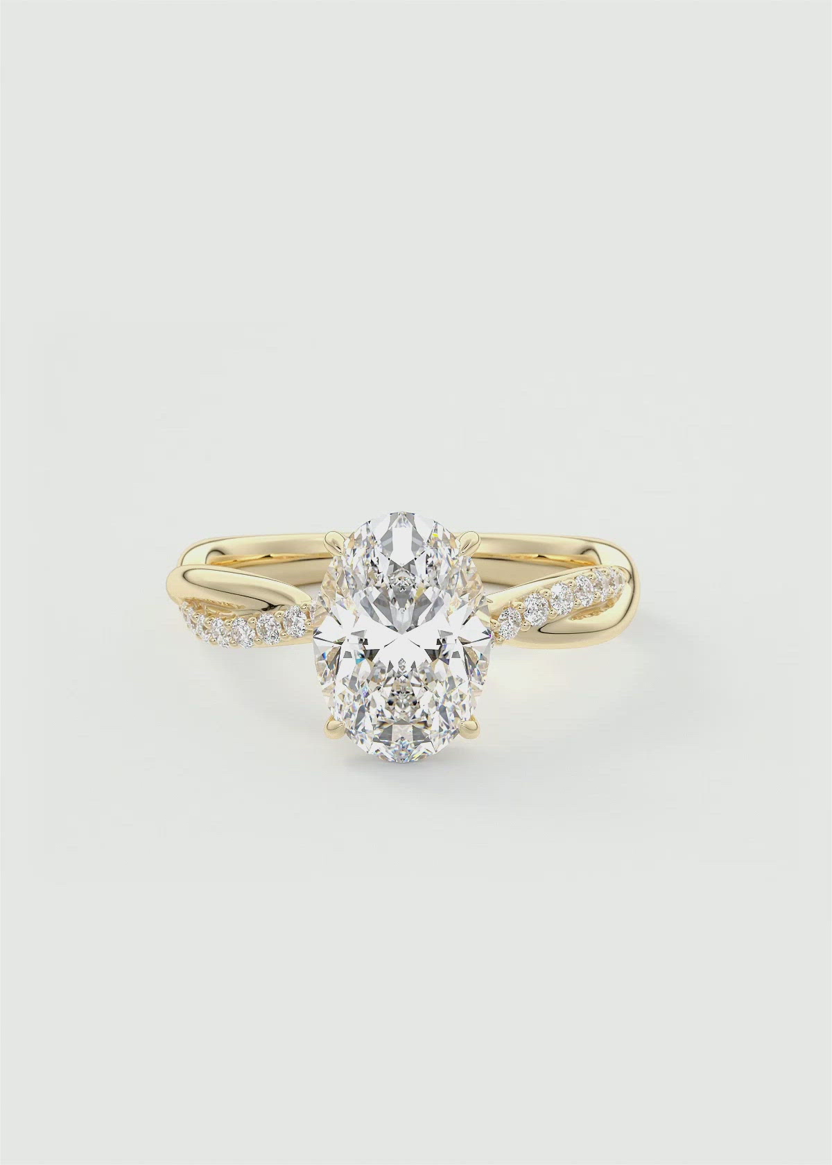 Oval Engagement Ring with Twisted Pavé Band and Signature Plunge