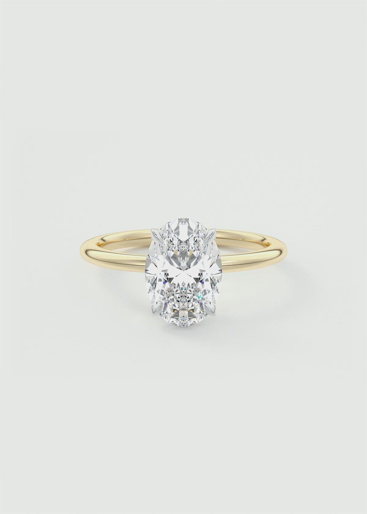 Two Tone Oval Cut Four Prong Engagement Ring with Knife Edge