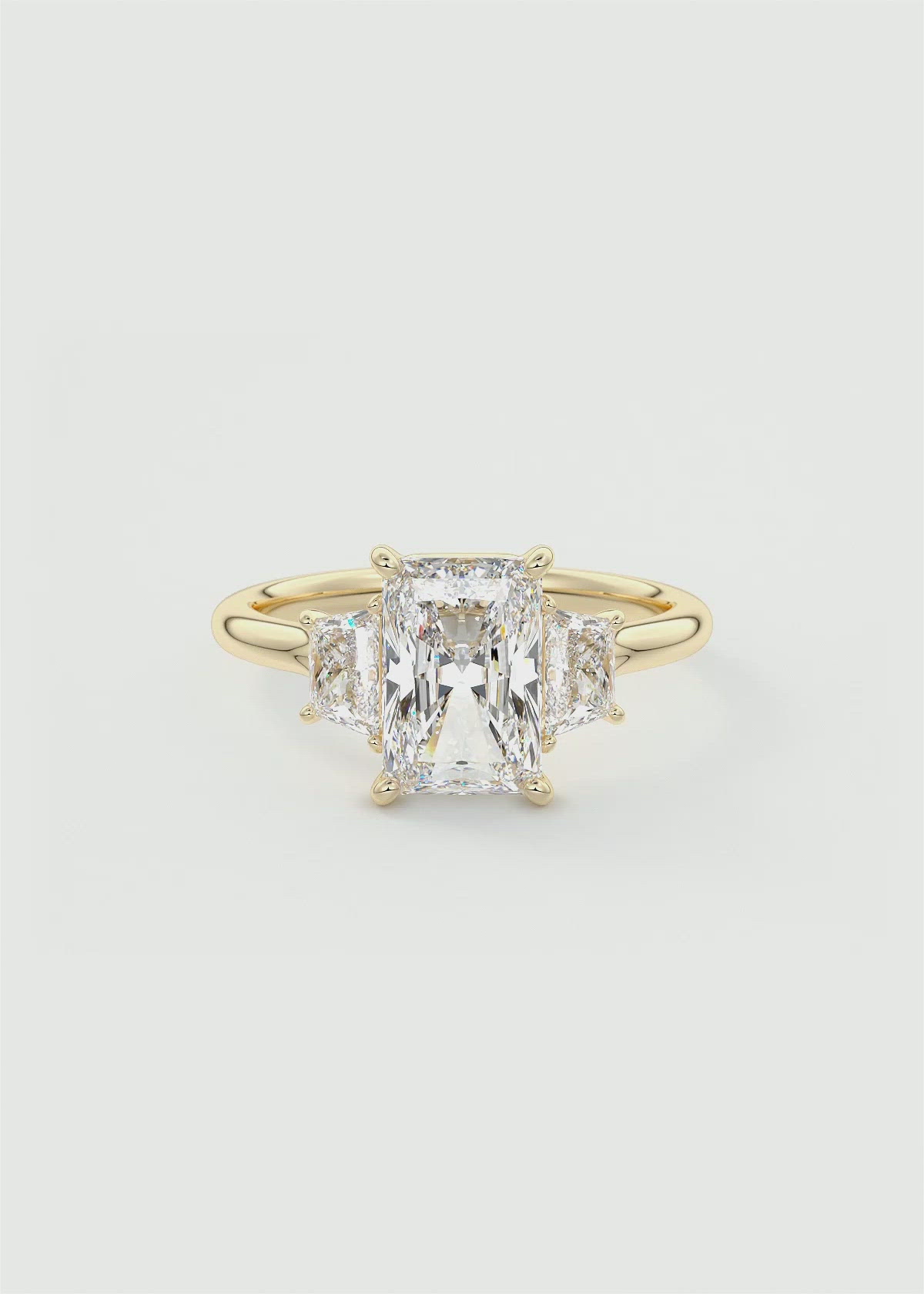 Low-Profile Radiant & Trapezoid Three Stone Engagement Ring by