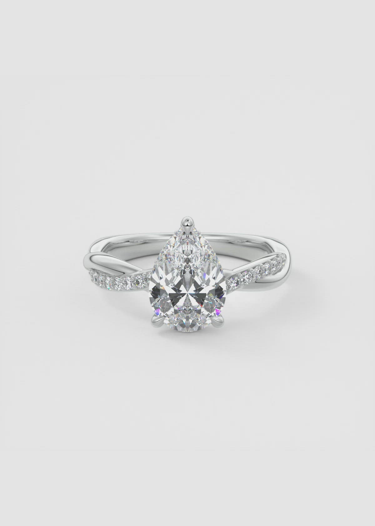 Pear Engagement Ring with Twisted Pavé Band and Signature Plunge
