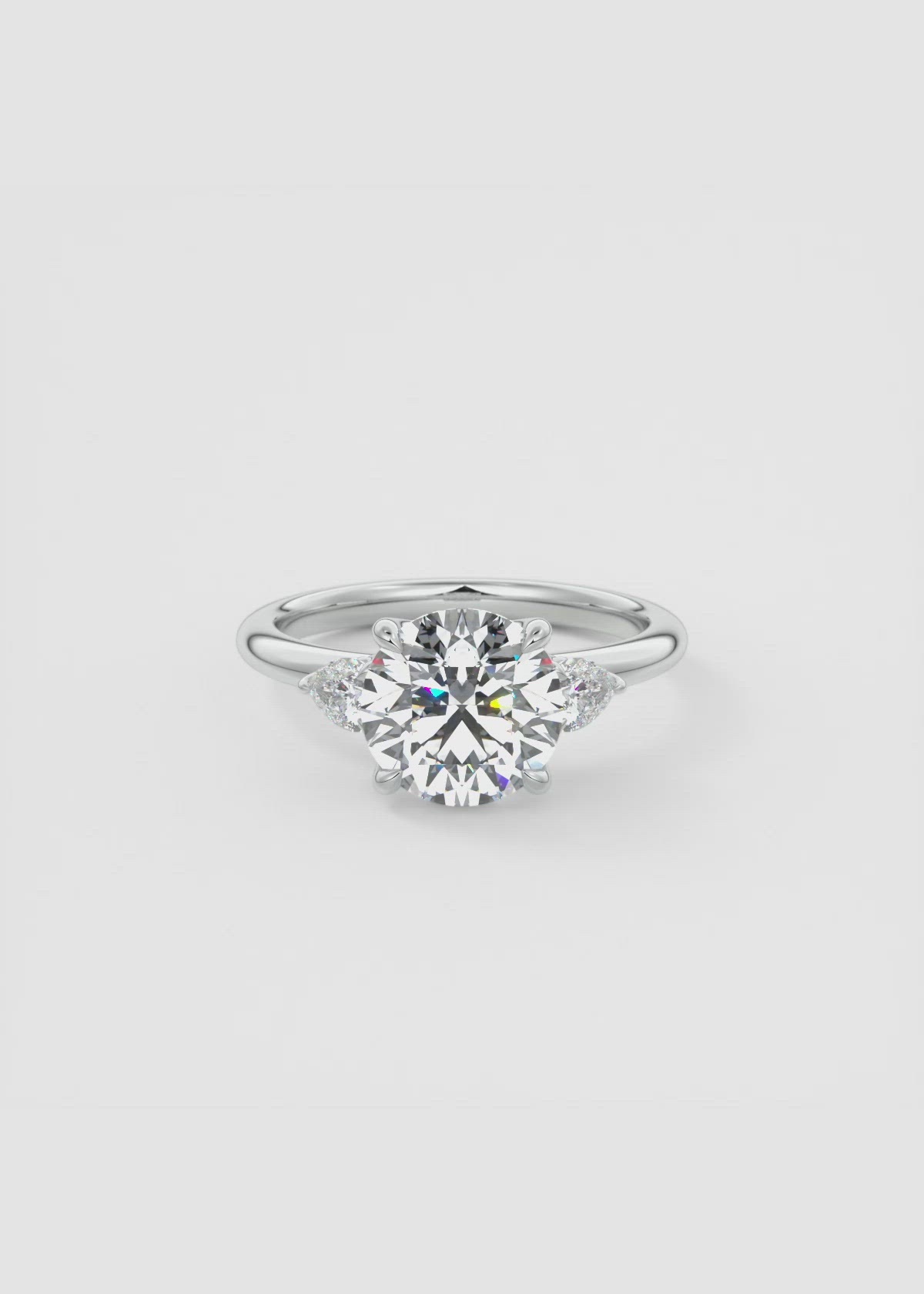 Floral Three Stone Engagement Ring with Pear Side Stones by Frank