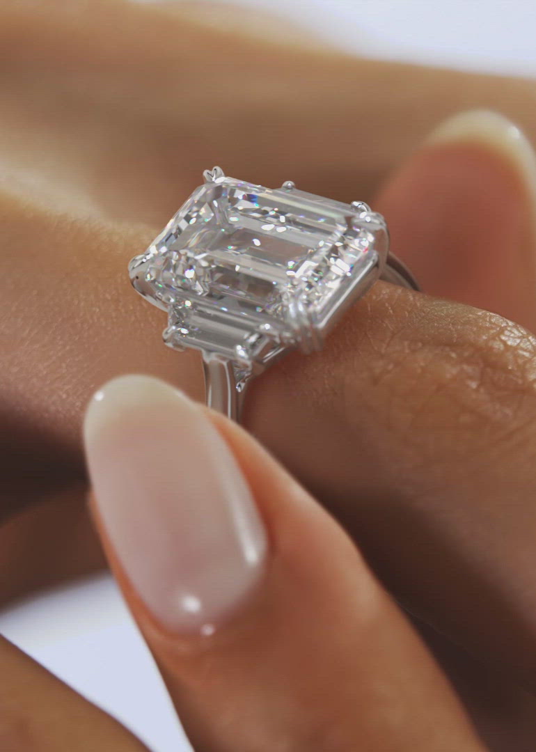 Emerald Cut Three Stone Engagement Ring with Elongated Trapezoids