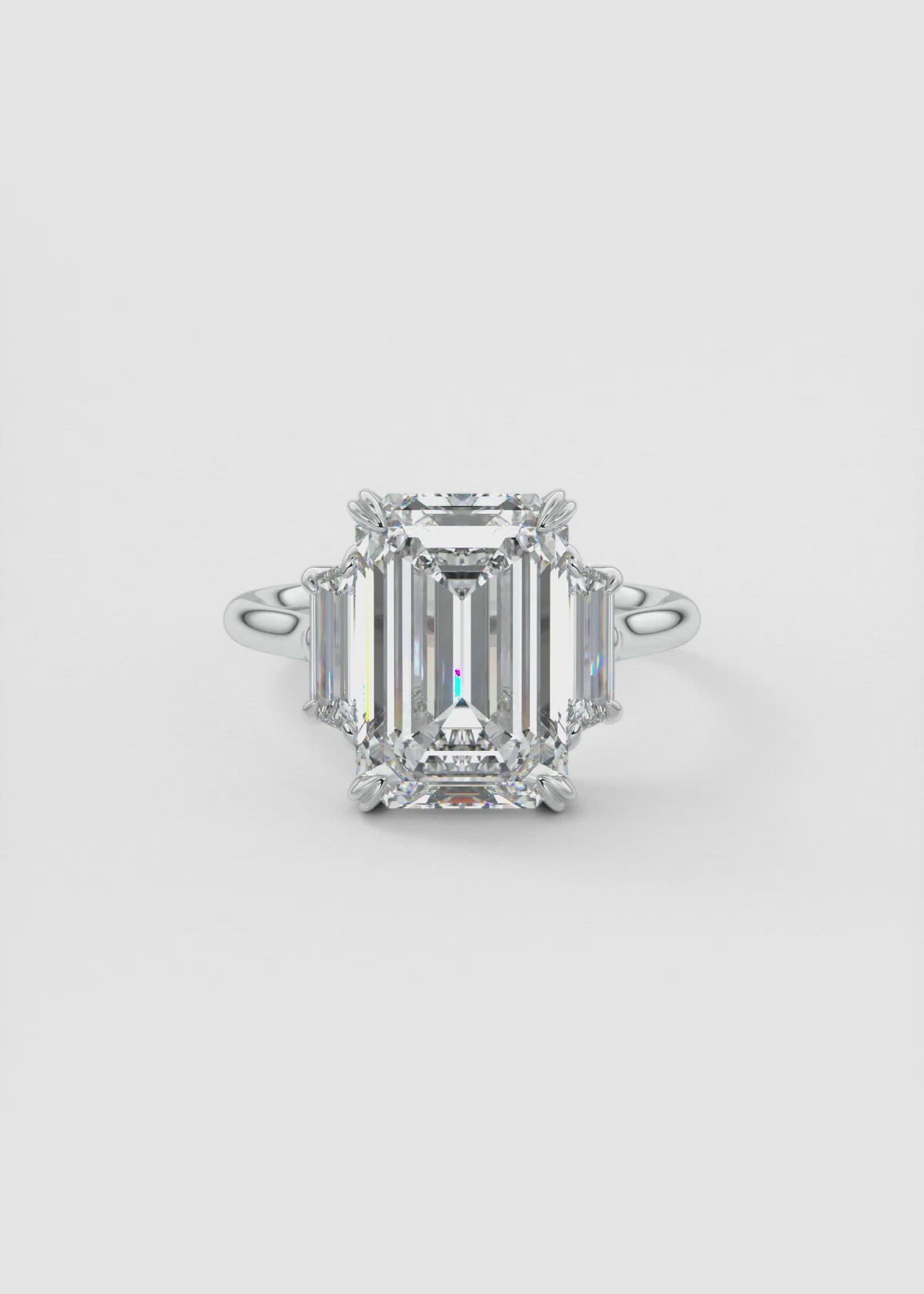 Emerald Cut Three Stone Engagement Ring with Elongated Trapezoids